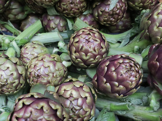 artichokes in a crate on the market