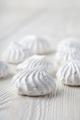 French vanilla meringue cookies close up white background.
