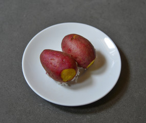 Sweet potatoes on white dish