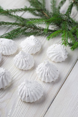 French vanilla meringue cookies close up white christmass background.