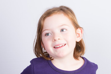 Beautiful Emotional little girl isolated on a white background