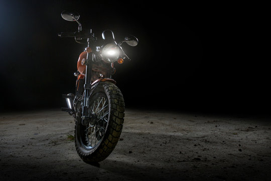 Motorbike under back lit light,black background