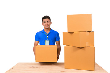 delivery asian man. Happy young courier holding  box and smiling on white background