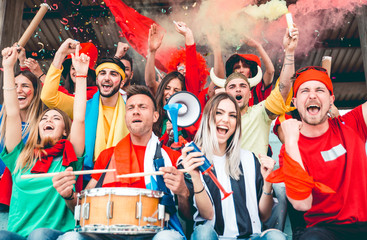 Football fans supporting their team at the arena for the world championship,