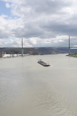 River Seine with canal Barge and Brotonne Bridge in background