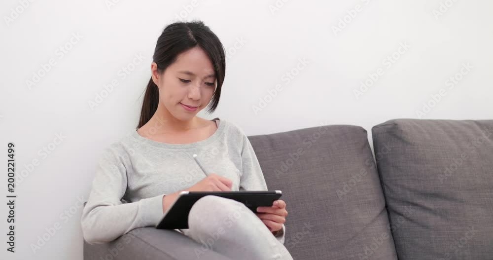 Poster Woman drawing on tablet computer