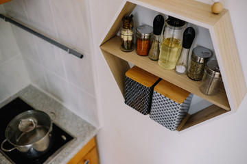 Kitchen shelf with spices jar 