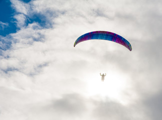 Ringstead Bay, Dorset / England. 02/15/2018. Paragliding pilots riding the wind off the cliffs of the Dorset Coast in training for the British Open Competitions in July. 