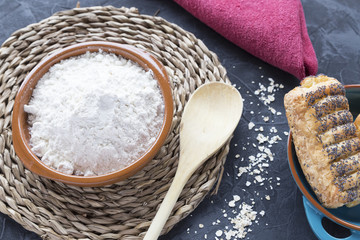 Flour in clay dish with puff pastry.