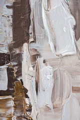 close up of beige and brown brush strokes of oil paint