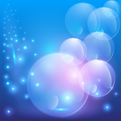  Vector blurry circles against light blue background, colored pink and blue.