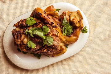 Pork shank on a plate.