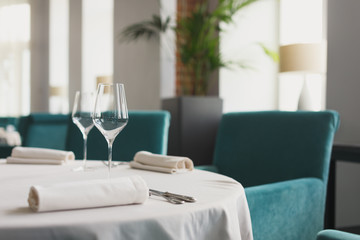 Empty glasses set in restaurant. Beautiful table set