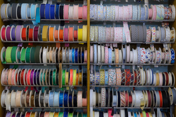 colorful ribbons on the shelf in the store