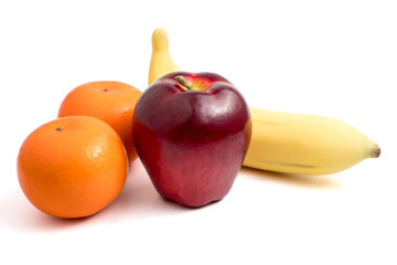 Fresh fruits with apple, banana and oranges on white background.