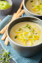 creamy potato and leek soup in bowl