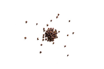 Dried whole seed of Neapli Timut pepper isolated on a white background.  Horizontal composition....