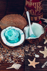 Blue ice cream in coconut bowl. Summer vacation