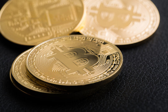 Bitcoins on leather background