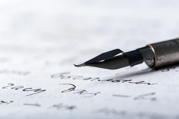 Fototapeta premium Fountain pen on an antique handwritten letter