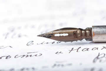 Fototapeta premium Fountain pen on an antique handwritten letter
