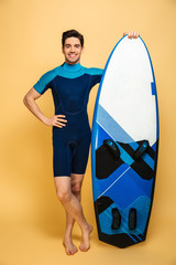 Handsome young man dressed in swimsuit