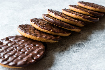 Stack of Chocolate Covered Round Jaffa Cookies / Whole Wheat.