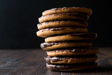 Stack of Chocolate Covered Round Jaffa Cookies / Whole Wheat.