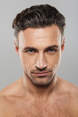 Handsome mature man. Looking camera.