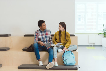 high school students couple doing homework together