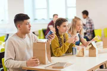 group of high school students at school cafeteria together