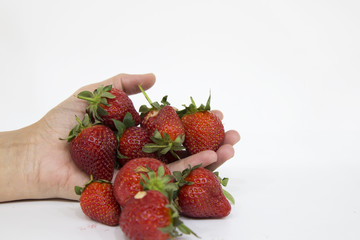 Strawberries in Shopping Cart, Isolated on White Background. Buying a strawberries from supermarket.
