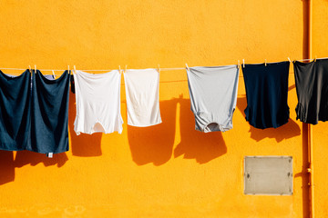 Laundry hanging on rope in Burano island, Venice, Italy