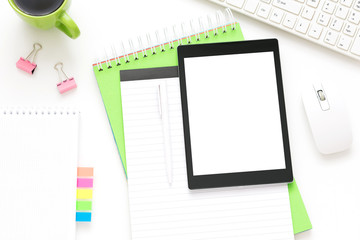 white Desk, tablet PC, lying on the table, white background with copy space, for advertisement, top...