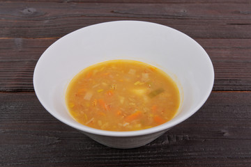Potato soup with flakes on a table