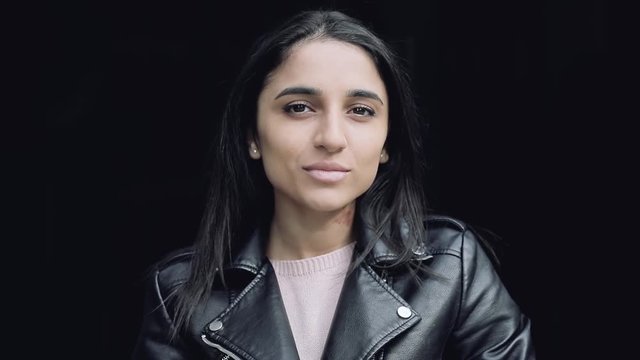 Stylish woman in black leather jacket