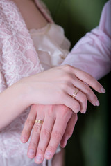 Concept of wedding, proposing to marry, young man holding hands, ring in hands declaring his feelings, saying I love you, marriage proposal 