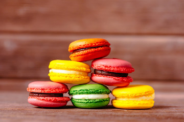 Stack of colorful macaron cookies.