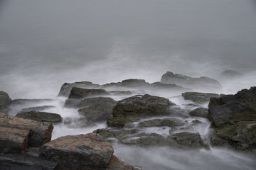 Ocean Waves Over Rocks at Cliff Walk in Rhode Island