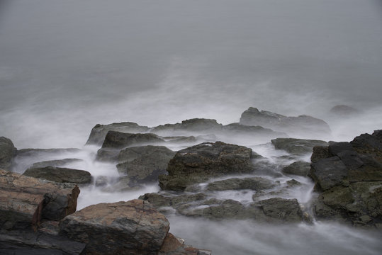Ocean Waves Over Rocks at Cliff Walk in Rhode Island