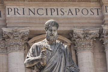 Statue of Saint Peter holding the keys of the Christian church in Saint Peter's Square Vatican City