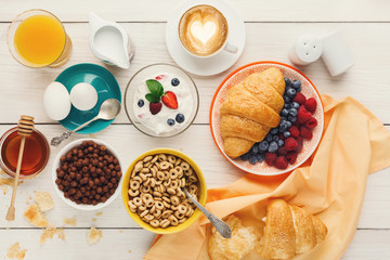 Continental breakfast menu on woden table