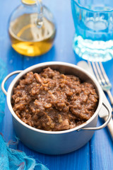 rice with rabbit on dish on wooden background