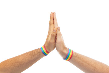 lgbt, same-sex love and homosexual relationships concept - close up of male couple hands with gay...