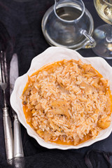 rice wtih cod fish and tomato on beautiful white bowl