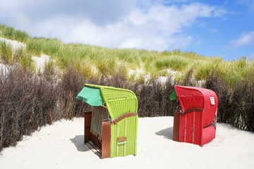 Beach scene with beach chairs on the island "Helgoland", North Sea, Northern Germany