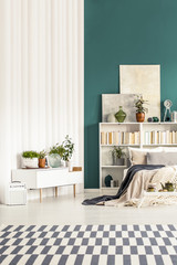 White and green bedroom interior