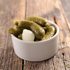 gherkin on wood background