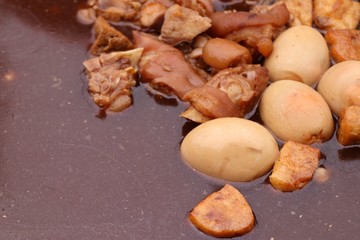 Eggs and pork in brown sauce