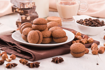 Hazelnut shortbread sandwiches filled with chocolate cream 